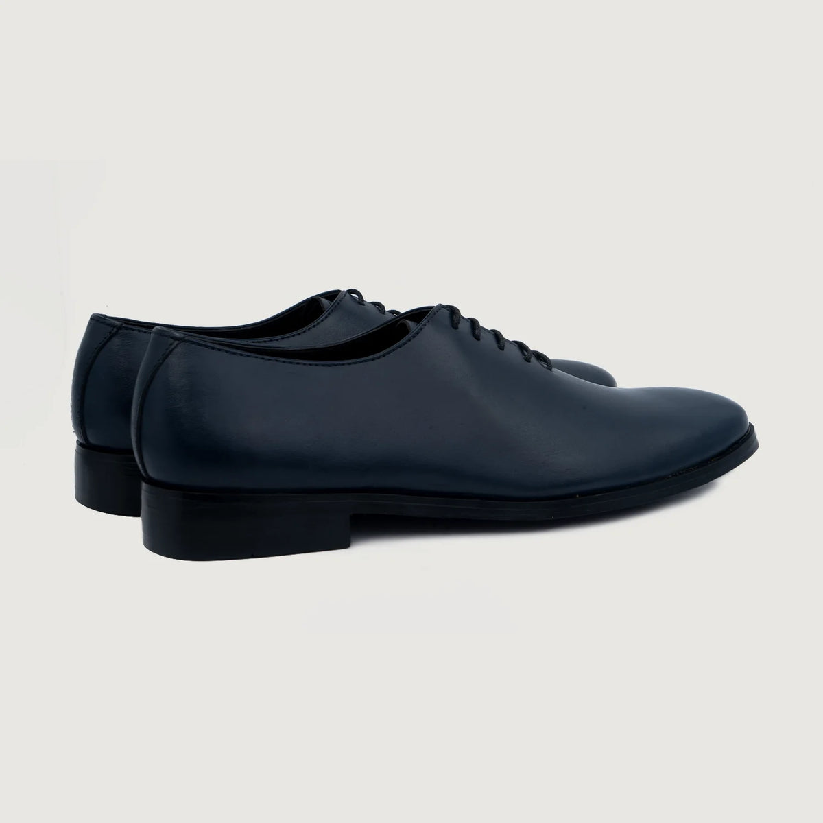 Close-Up Detail of Classic Collar & Heavy-Duty Zipper Hardware on Director Wholecut Midnight Blue Leather Shoes For Men