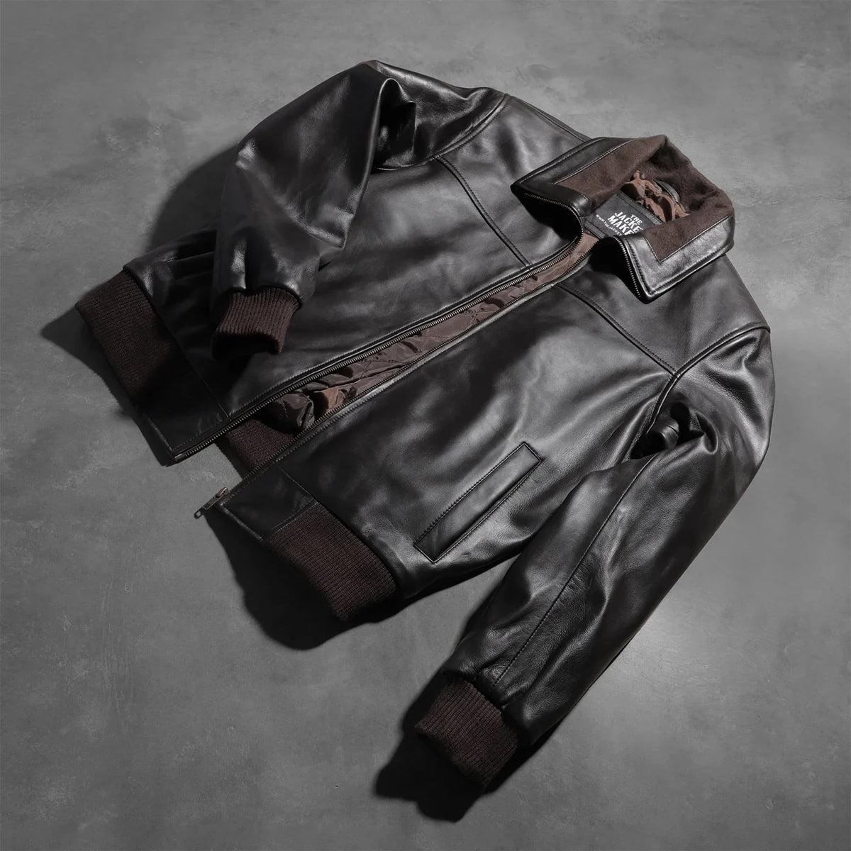 
Rib Knit & Hem Craftsmanship Construction Detail on Men's Air Rolf Mocha Brown Leather Bomber Jacket