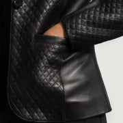 
Close-Up Detail of Notch & Button Hardware on Women's Cora Quilted Black Leather Blazer