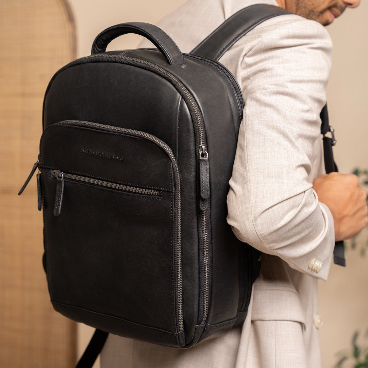 
Classic 100% Full-Grain leather Backpack - Rear Perspective Showing Reinforced Leather Straps & Stitching