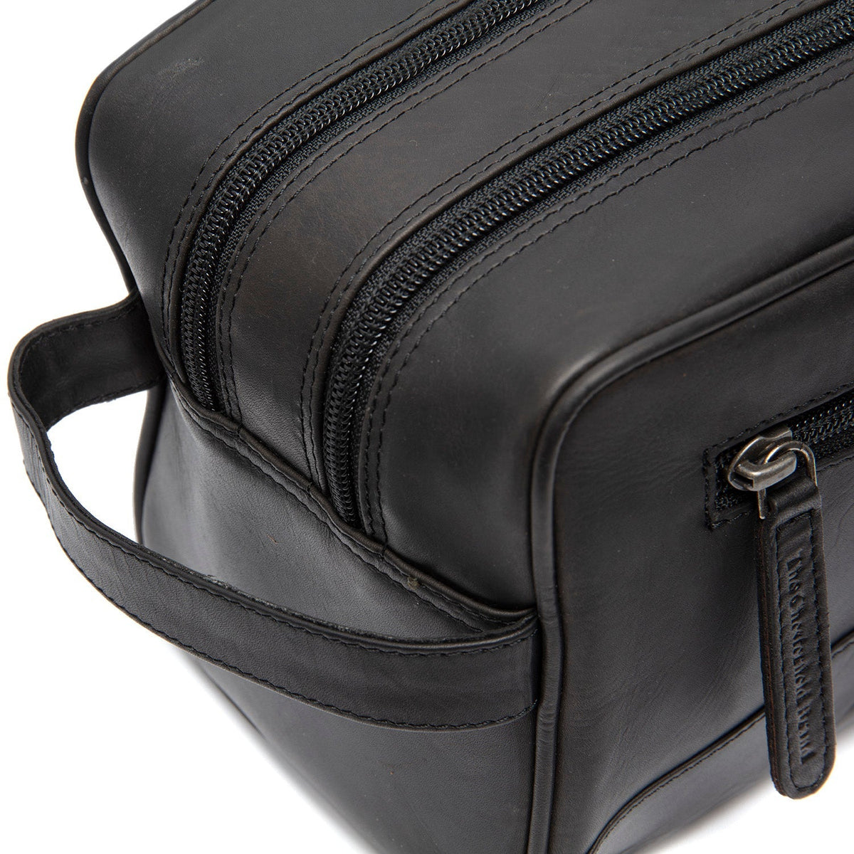 
Close-Up Detail of Classic Collar & Heavy-Duty Zipper Hardware on Stacey Full-Grain Leather Toiletry Bag